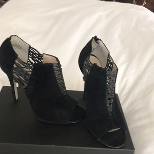Black suede.  Peep toe booties. 4 in heel.  Size 6